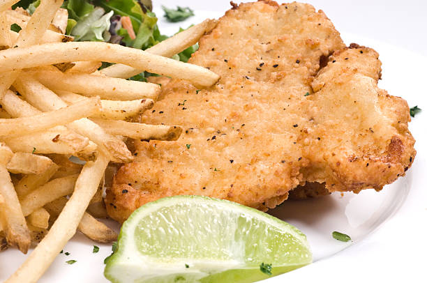 istock Breaded chicken, salad, and fries 157307384