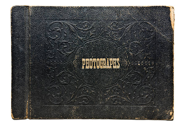 Vintage Photo Album Cover Nineteen-forties era leather photograph album cover. Leather shows lots of wear. old black leather photo album stock pictures, royalty-free photos & images