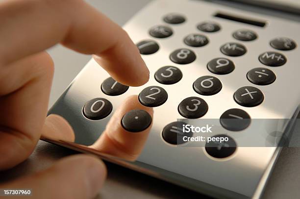 Ręka Z Kalkulatora Silver - zdjęcia stockowe i więcej obrazów Znak minus - Znak minus, Znak plus, Barwne tło