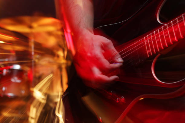 istock Dynamic, colorful close-up of guitarist's hand 157308074