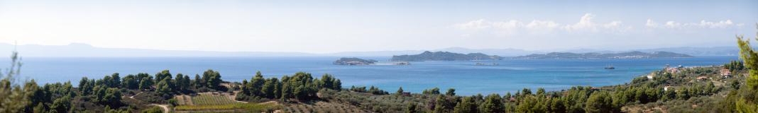 View from a hill over the bay of Ouranoupoli (Halkidiki, Greece). You can see the small Island of Amoliani.