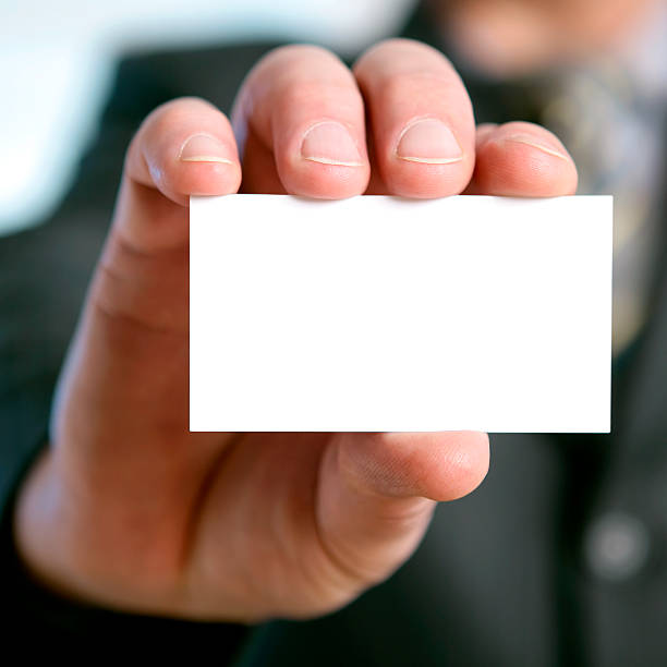 istock Blank business card in a hand 157308410