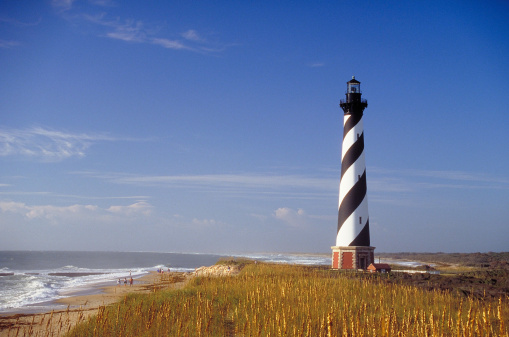 Part of the beautiful Cape Hatteras National Seashore, the Bodie Island Lighthouse is an Iconic Lighthouse of Nags Head Outer Banks North Carolina. This incredible stretch of coastal barrier islands along the east coast of NC is known for its amazing beaches and abundant wildlife.