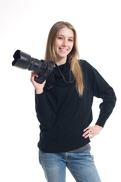 istock Happy Female Photographer Holding Camera Isolated White Background 157308783