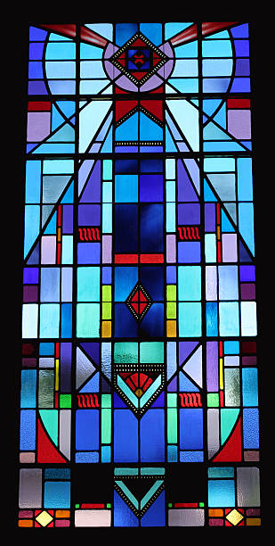 Blue Stained Glass A stained glass window in a church in Pennsylvania.  The windows were created at the turn of the 20th. century.  stained glass stock pictures, royalty-free photos & images
