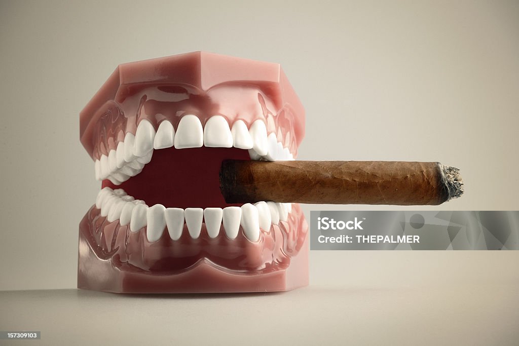smoking and happy nonsense, who says smoking is bad for you? do i look bad to you? Smoking Issues Stock Photo