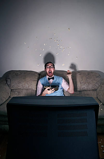 istock Surprised Nerd Watching A Scary Movie 157309209