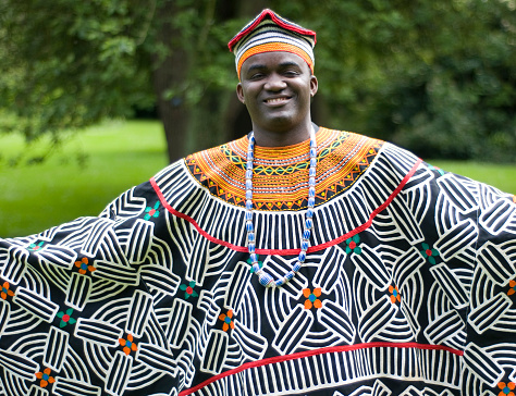 A Cameroonian man wearing traditional African clothing.