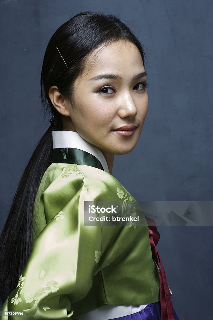 Korean traditional dress - studio portrait  Turning Stock Photo