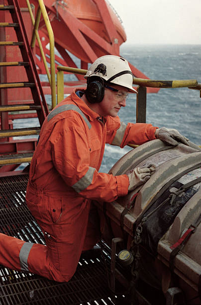 Engineer wearing safety uniform sitting on railway inspection. construction worker on railways. Engineer work on Railway. Rail, engineer, Infrastructure.