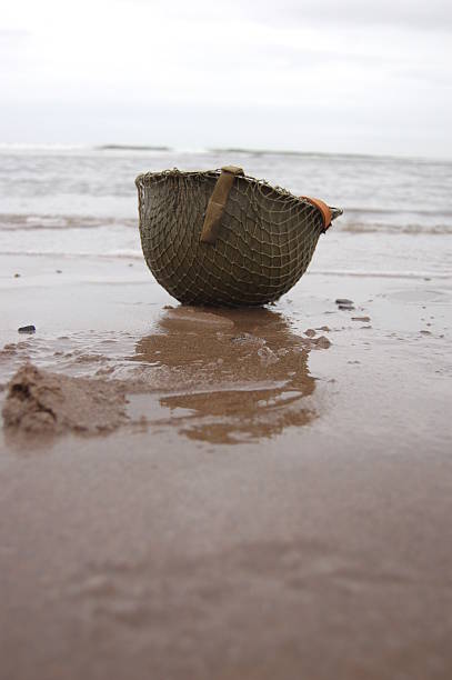 Helmet on Omaha Beach. stock photo