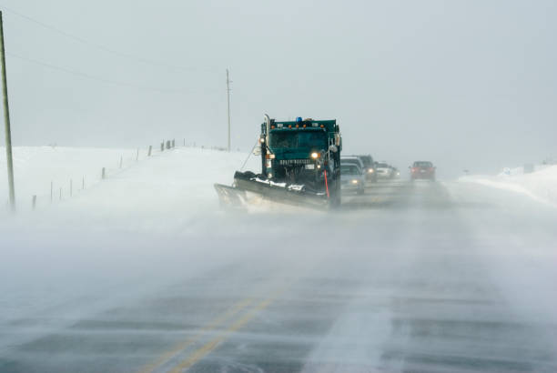 istock Snowplow Followed by Traffic 157309819