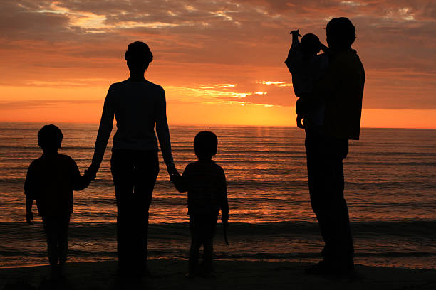 Family sunset stock photo