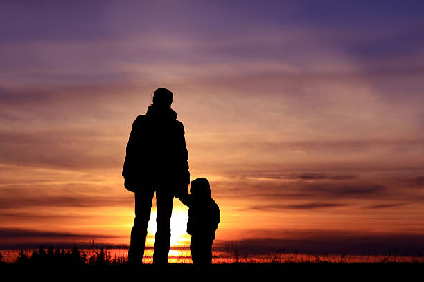 istock Mother and Child Watching the Sunset Bonding 157310957