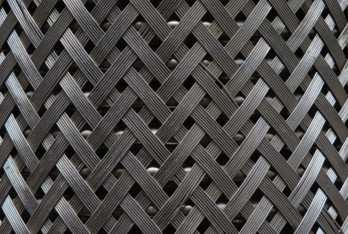 Close-up at rustic steel grate that using for cover the sewer drain way. Object, background texture photo.