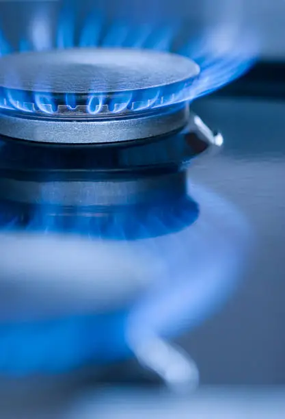 Blue Flames burning from a gas stove.