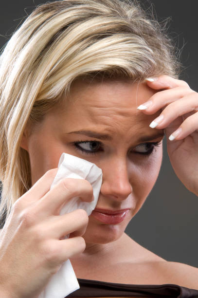 istock crying beautiful blond woman 157311788
