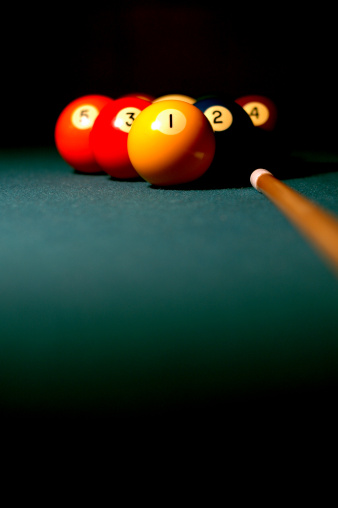Pool balls racked for a game of 9-ball.