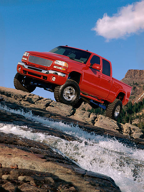 Red Truck on the rocks stock photo