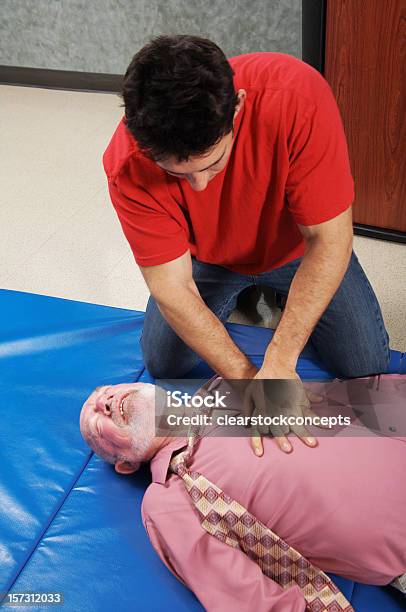 Cpr Chest Compressions Stock Photo - Download Image Now - Adults Only, CPR, Chest - Torso