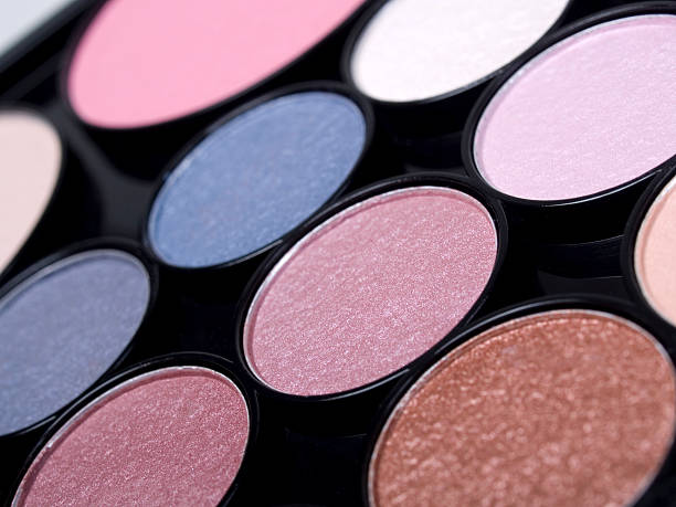 istock Close-up of rows of multicolored eye shadows 157312222