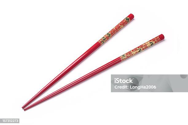 Two Red Chopsticks On A White Background Stock Photo - Download Image Now - Chopsticks, Cut Out, Chinese Culture