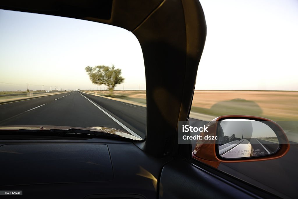 riding down the highway in a red convertible sports car  Car Stock Photo