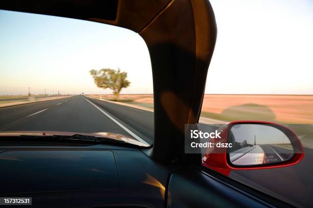 Riding Down The Highway In A Red Convertible Sports Car Stock Photo - Download Image Now