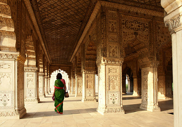 Interior of Red Fort, Delhi, India Indian Woman Walking in the Red Fort, Delhi, India delhi stock pictures, royalty-free photos & images