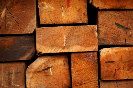 full frame of pattern on stacks of logs background