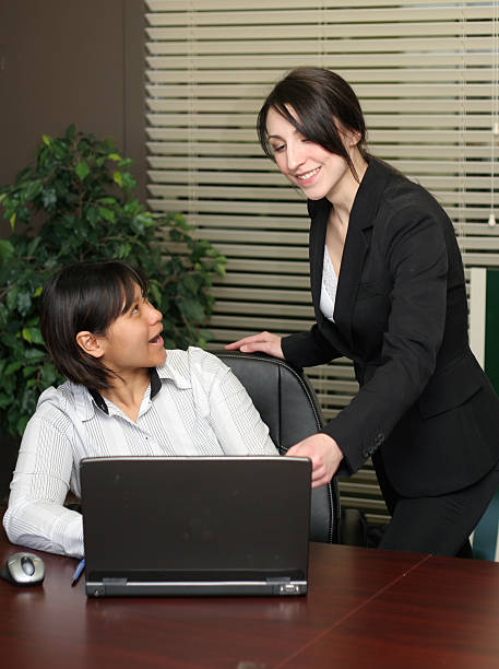 istock Businesswomen Laptop Teamwork 157313121