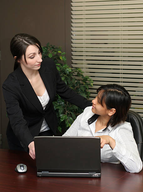 istock Two businesswomen with laptop 157313126
