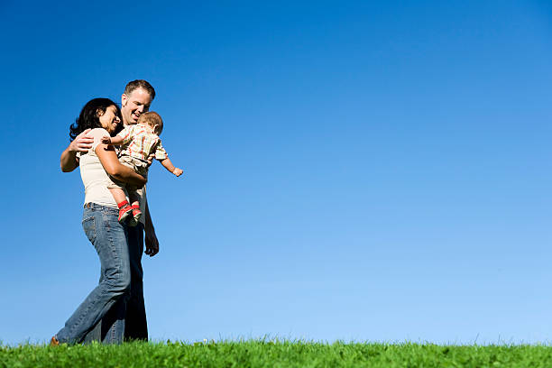 Family Strolling On A Summer Day Stock Photo - Download Image Now - Child,  Latin American and Hispanic Ethnicity, Parent - iStock
