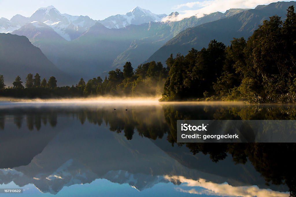 Lago Matheson amanhecer - Foto de stock de Cena Não-urbana royalty-free