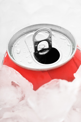 coca cola with Ice, selective focus on top of the coke can