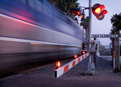 Train speeding through a crossing at San Clemente, CA.