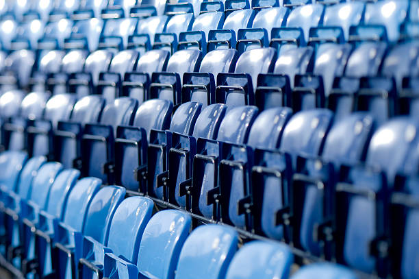 istock blue tip-up seats in baseball stadium 157313731