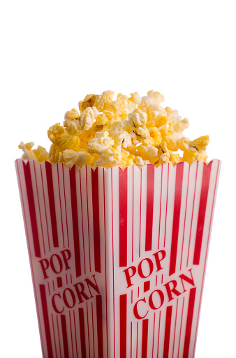 A bucket of popcorn isolated on a white background.