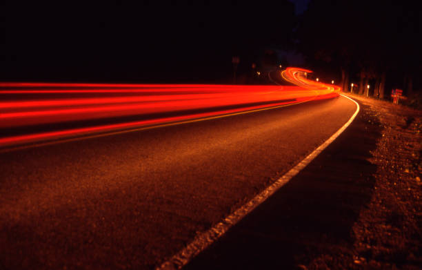 istock Long exposure of tail lights on a road. 157313947