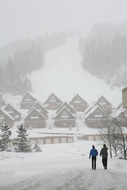 istock Couple at Ski Resort During Snowy Day 157314363