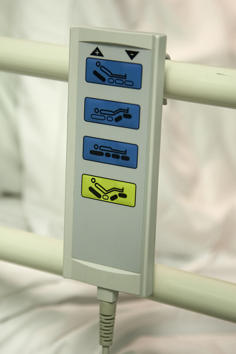 Hospital bed adjuster