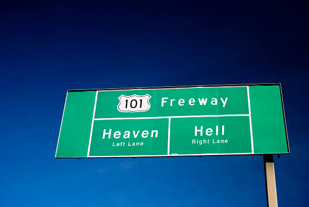 céu ou hell - heaven hell road sign sign imagens e fotografias de stock