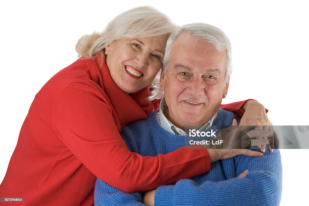 senior par abrazar sobre fondo blanco - Foto de stock de 65-69 años libre de derechos