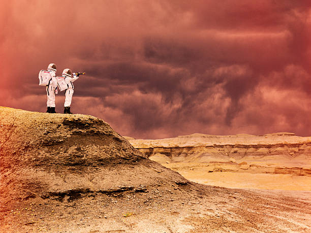 Lunar Landing Two children dress up as astronauts and use their imaginations to discover new frontiers.  cosmonaut photos stock pictures, royalty-free photos & images