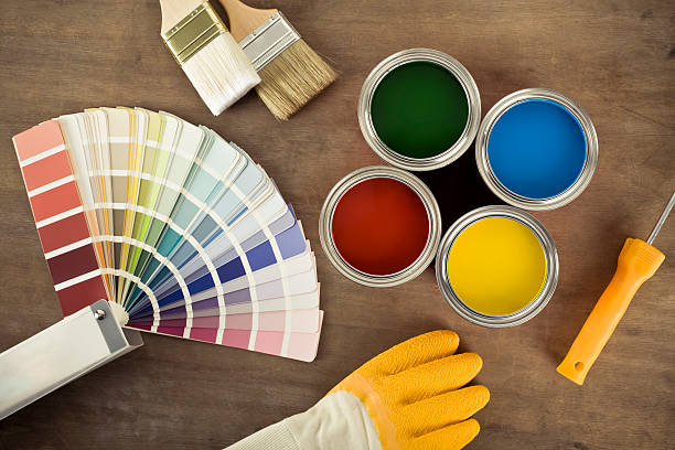 Paint cans and color chart stock photo
