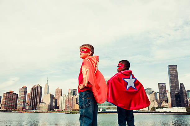 マンハッタンの英雄 - partnership creativity superhero child ストックフォトと画像