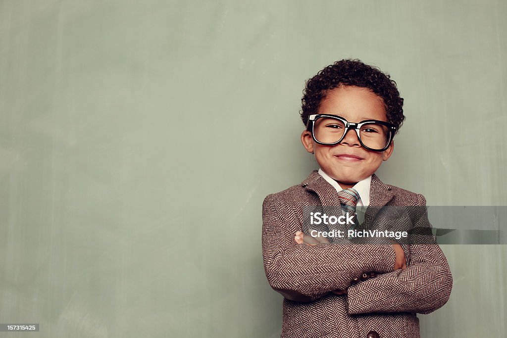 Happy Teacher A young boy and knowledge whiz is ready to teach the class. Just add smart copy for the perfect concept. Child Stock Photo
