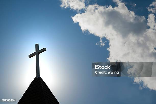 Easter Morning With The Sun Behind A Church Steepl Cross Stock Photo - Download Image Now