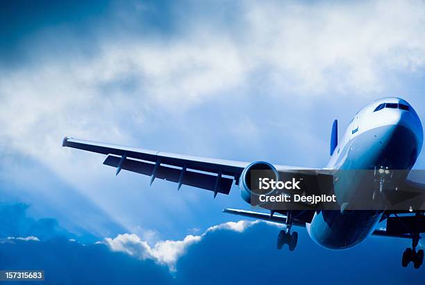 Airliner Landing In A Storm Stock Photo - Download Image Now - Aircraft Wing, Airplane, Aerospace Industry