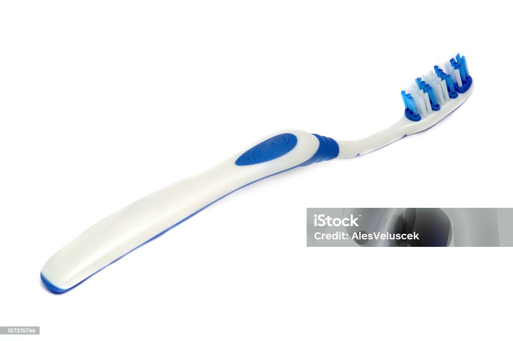 White and Royal blue toothbrush on a white background toothbrush Blue Stock Photo